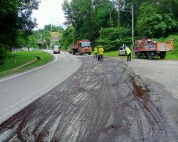 KERJA-KERJA PENURAPAN JALAN ROSAK DI JALAN TOK DAGANG